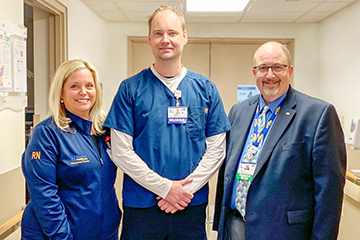 Gavin Zakarevicz, RN, (center) is the recipient of Beebe Healthcare’s May 2019 L.O.V.E. Letter. Also pictured are Loretta Ostroski, Director of Patient Care Services, left, and Rick Schaffner, Interim CEO, Executive VP & Chief Operating Officer. Gavin Zakarevicz, RN, (center) is the recipient of Beebe Healthcare’s May 2019 L.O.V.E. Letter. Also pictured are Loretta Ostroski, Director of Patient Care Services, left, and Rick Schaffner, Interim CEO, Executive VP & Chief Operating Officer.
